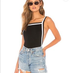 Gently used (maybe 4 times) - Super cute just pregnant and can’t wear lol.